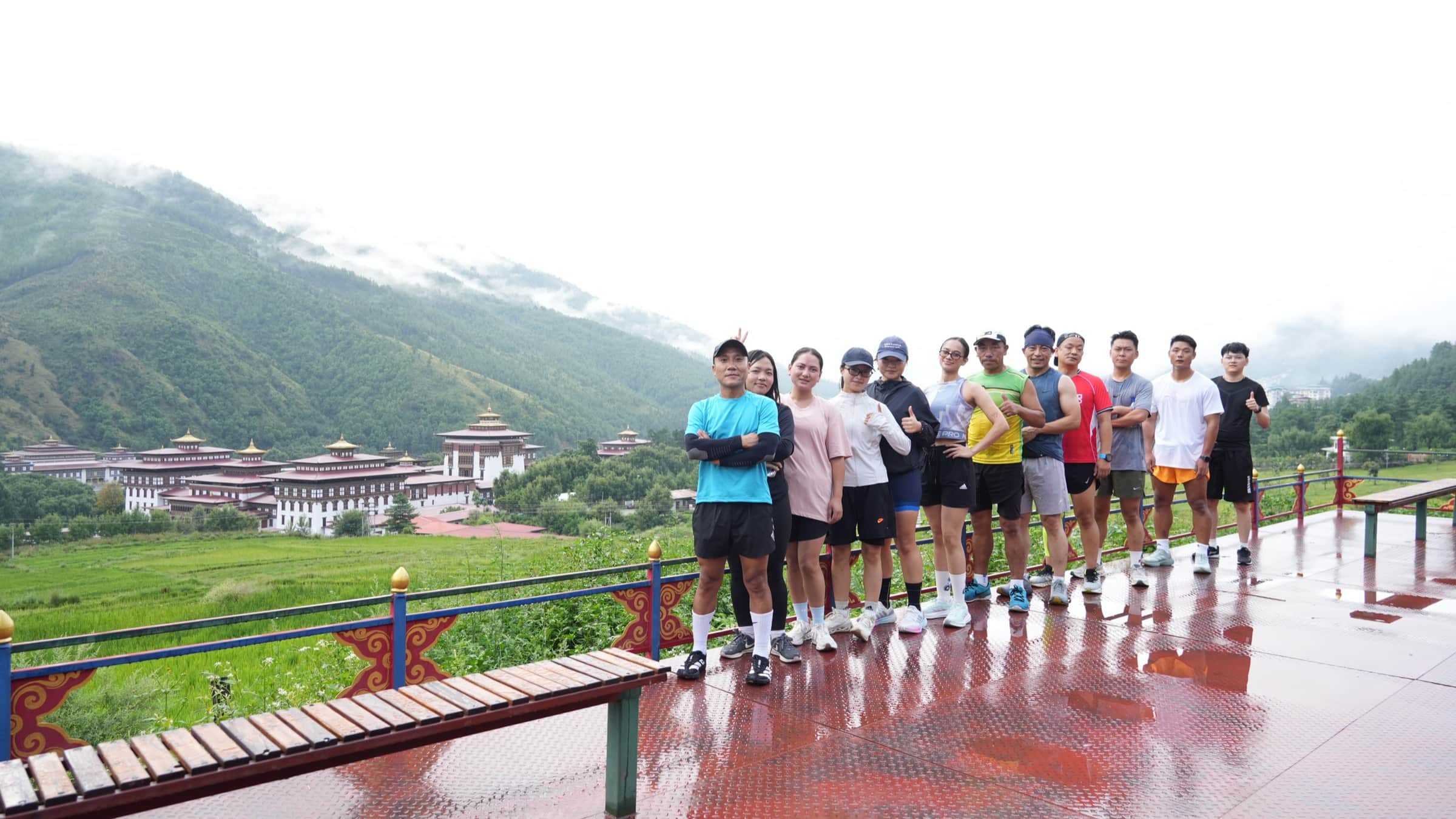 MountaiNation runners overlooking Tashichho Dzong, Thimphu