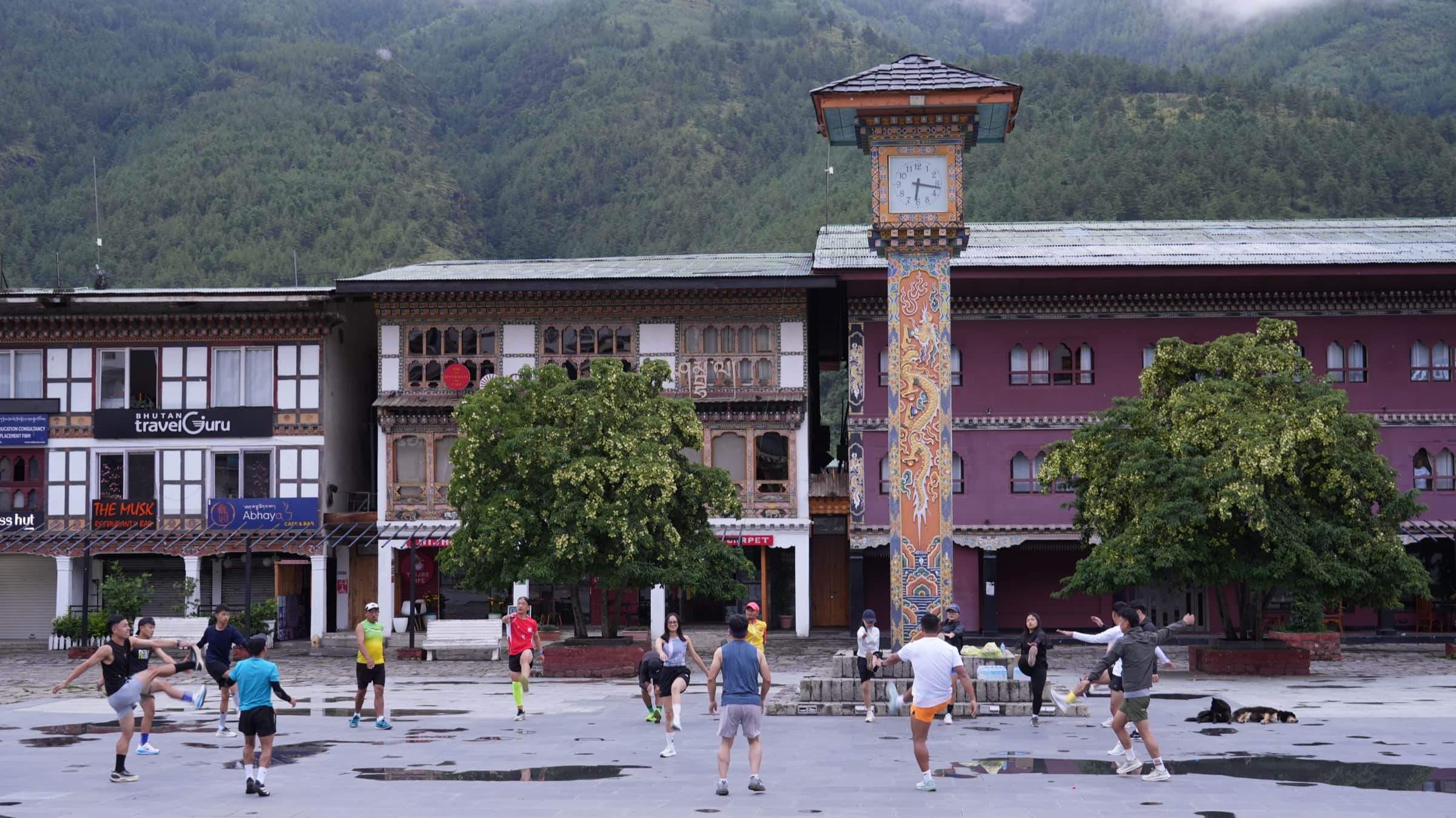 Community warm-up drills at the Thimphu Clock Tower Square